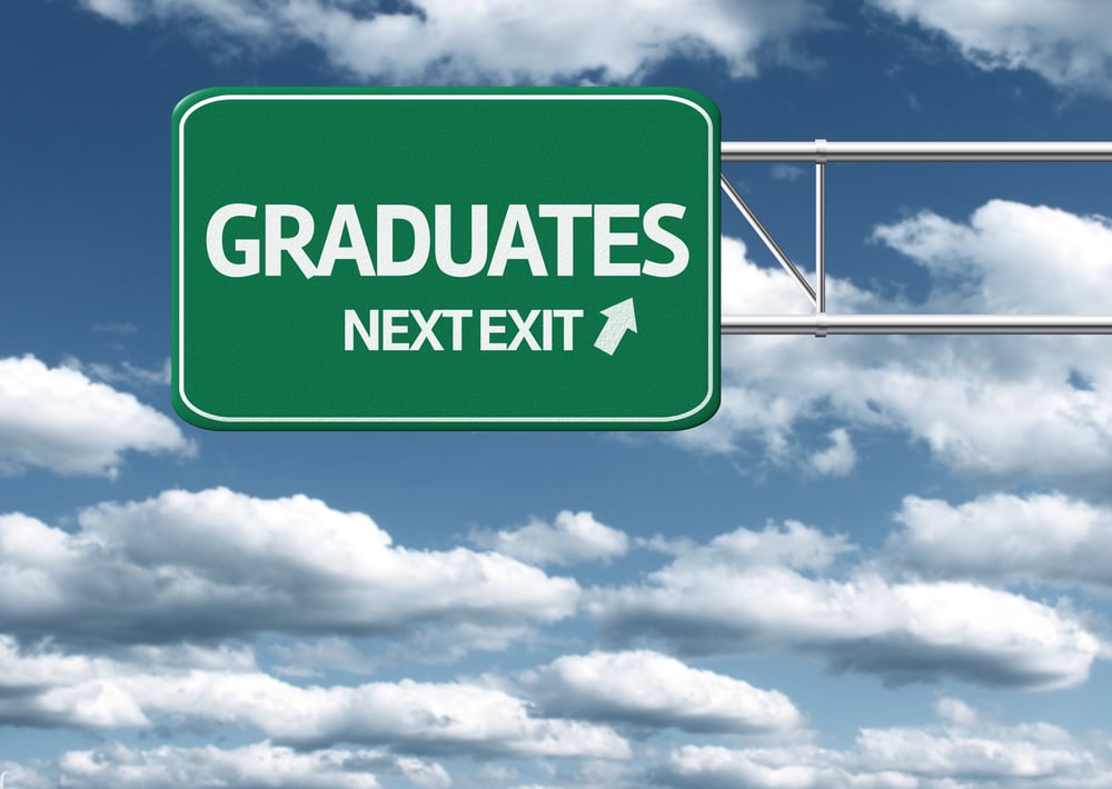 Creative sign with the message - Graduates Next Exit-1