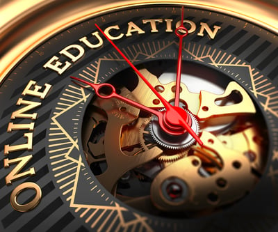 Online Education on Black-Golden Watch Face with Closeup View of Watch Mechanism.