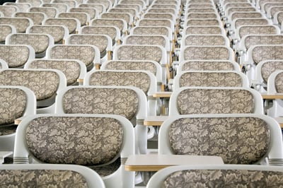 Rows of vacant seats in college lecture hall
